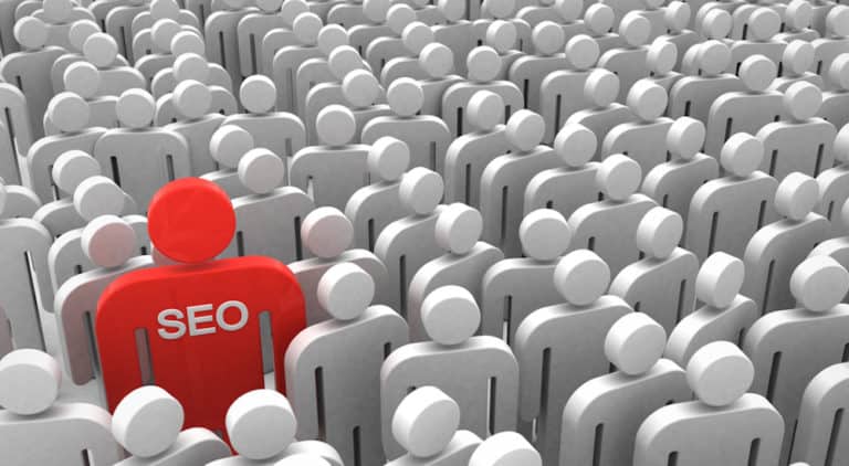 Crowd of grey silhouettes surrounding red SEO man