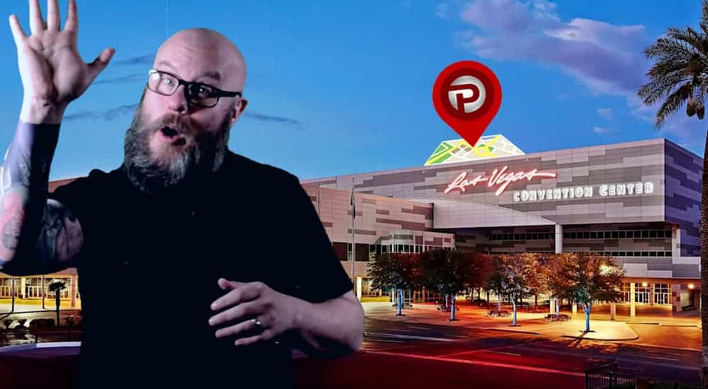Greg Gifford is standing in front of a Las Vegas building for Pubcon Las Vegas.